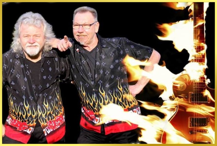 Foto von De Entertainer mit brennender Gitarre.